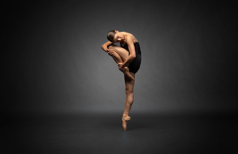 Dancer Curled in and on Pointe