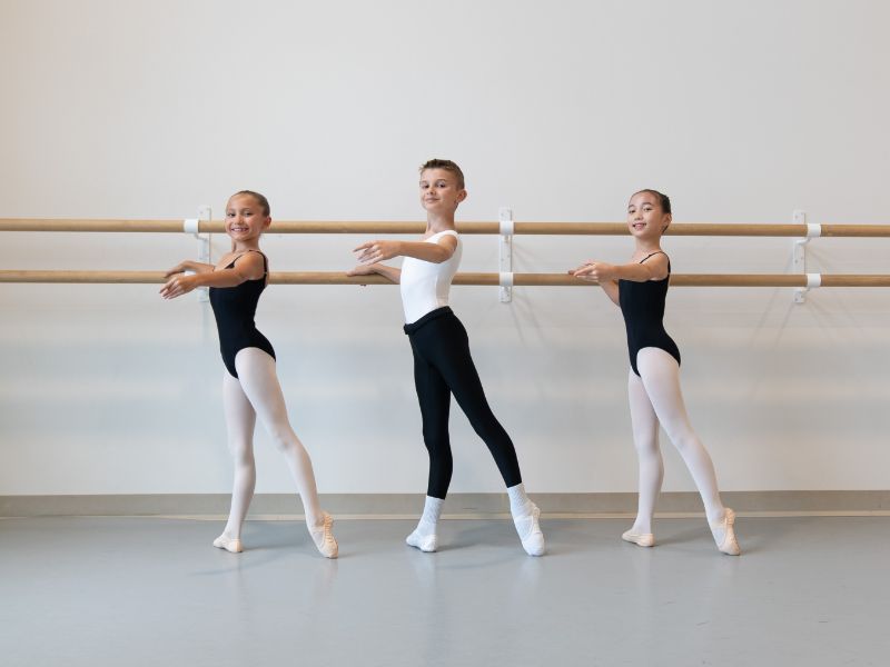 Three Dance Students at Barre